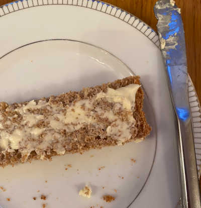 Simple bread-maker wholemeal sliced with butter